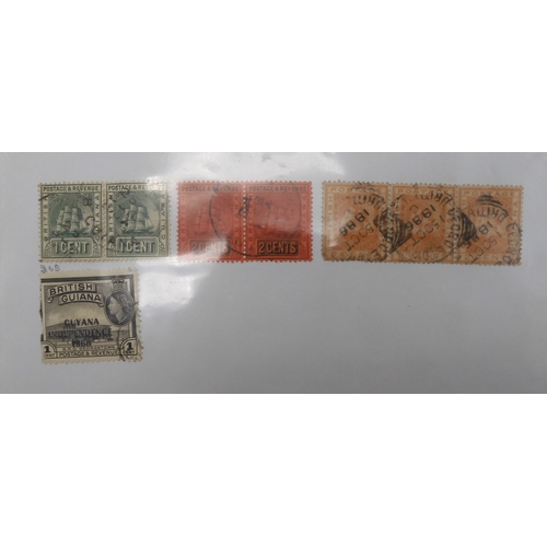 7041 - A world wide stamp collection with seven folders containing sheets of hinged used stamps many early ... 