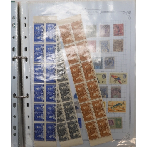 7041 - A world wide stamp collection with seven folders containing sheets of hinged used stamps many early ... 