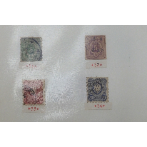 7042 - A worldwide stamp collection in eight folders to include good Australian, Spanish and German used st... 