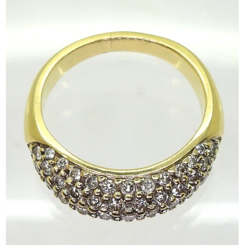 719 - An 18k gold diamond set dome ring, set with estimated approx 0.60cts of brilliant cut diamonds, size... 