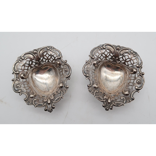 362 - A pair of silver bonbon dishes, by William Hutton & Sons, Sheffield, a pair of silver napkin rin... 