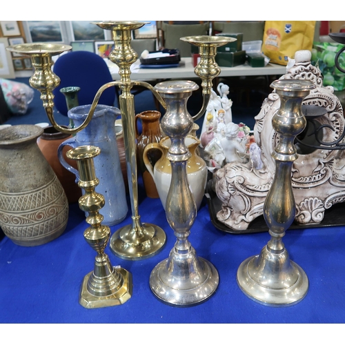 292 - A large metal candle tree and assorted candlesticks and a leaded glass shade