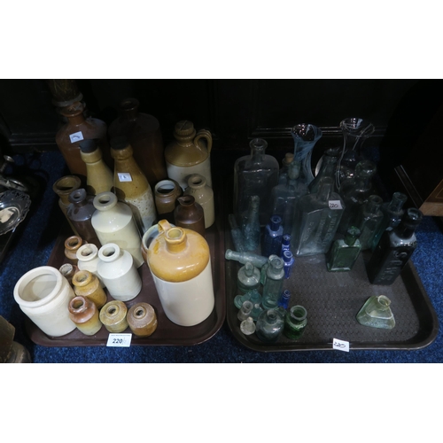 220 - A collection of stoneware and glass bottles