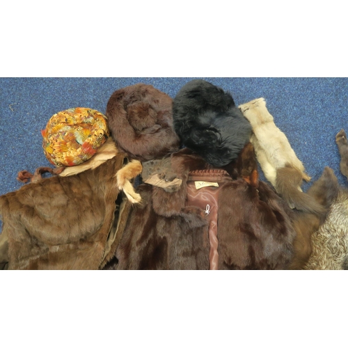 226 - A fox fur stole, a fur coat, a pheasant feather hat etc