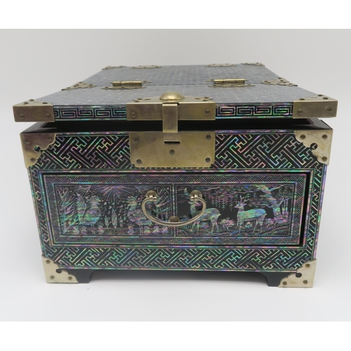 269 - A contemporary mother of pearl and black lacquer jewellery box, with fold up top, containing a mirro... 