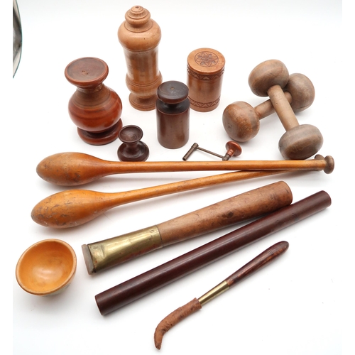 517 - A collection of treen, to include a substantial masher, two gilder's agate burnishers, a pair of Ind... 