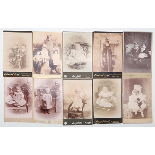 522 - A collection of late-19th/early-20th century portrait photographs by Glasgow photographers, a small ... 