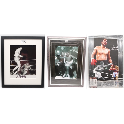 528 - Boxing - a collection of framed black and white photographs, one example apparently signed by Muhamm... 