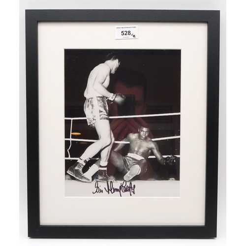 528 - Boxing - a collection of framed black and white photographs, one example apparently signed by Muhamm... 