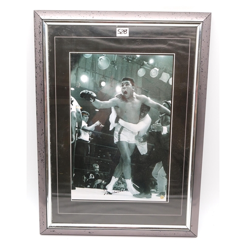 528 - Boxing - a collection of framed black and white photographs, one example apparently signed by Muhamm... 