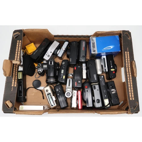 531 - A large assortment of point-and-shoot film and digital cameras and accessories, to include a boxed C... 