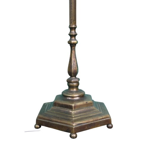 1 - A 20th century metallic standard lamp in the form of a 19th century street lantern, 180cm high 