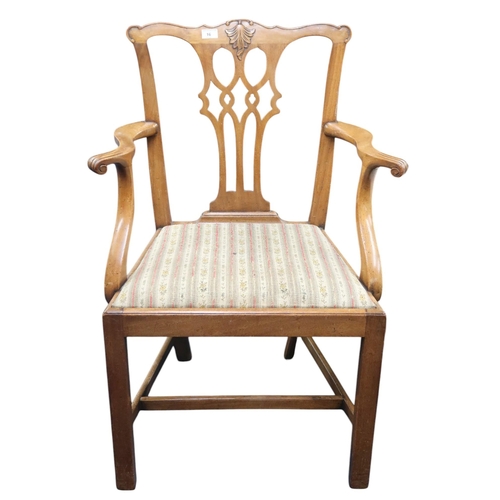 16 - A set of eight 19th century mahogany dining chairs with fret cut splats over drop in seat on square ... 