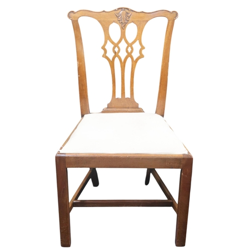 16 - A set of eight 19th century mahogany dining chairs with fret cut splats over drop in seat on square ... 