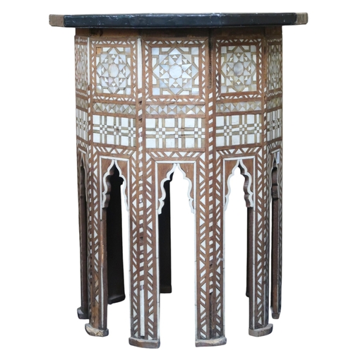 17 - A Moorish style dectagonal topped occasional table with faux marble top on ten sided mother of pearl... 