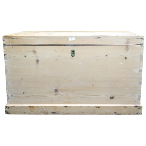 19 - A 20th century pine blanket chest with internal candle box on plinth base, 57cm high x 93cm wide x 5... 