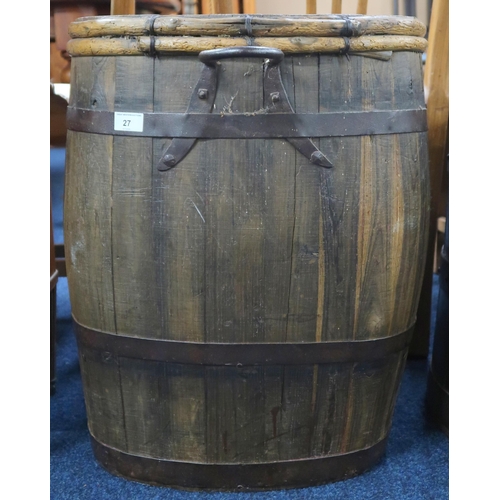 27 - A late 19th/early 20th century coopered barrel with mounted iron ring, 60cm high x 48cm wide x 48cm ... 