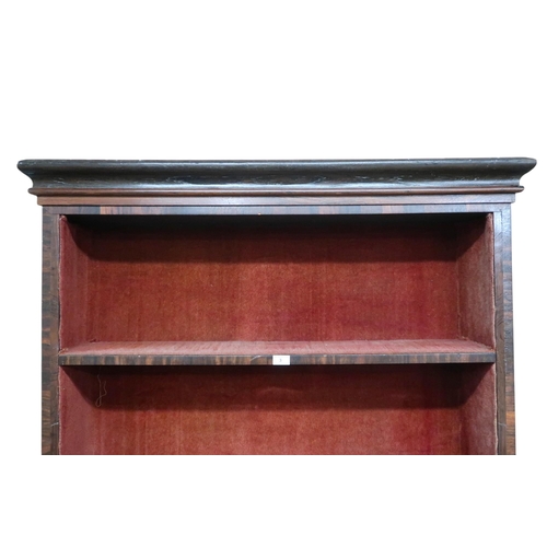 3 - A late 19th century rosewood veneered open bookcase with cornice over three open shelves on base wit... 