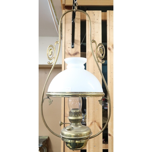 34 - A lot comprising a Victorian brass hanging oil lantern with opaque glass shade and another two brass... 