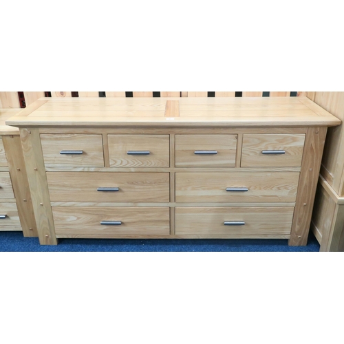 37 - A contemporary white ash bank of drawers with four short over two pairs of long drawers with metalli... 