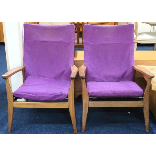 46 - A pair of mid 20th century teak Furpro (Furniture Productions Ltd) lounge chairs with purple upholst... 