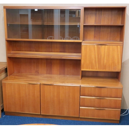 59 - A mid 20th century teak McIntosh media display unit with glazed sliding doors alongside open shelves... 