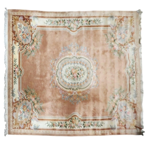 64 - An impressively large deep pile Aubusson style carpet with floral patterned central medallion within... 