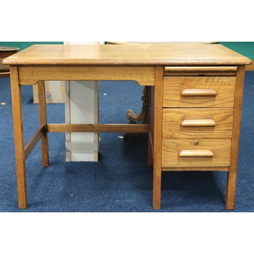 67 - An early 20th century oak single pedestal desk with pull out slide over three drawers, 70cm high x 1... 