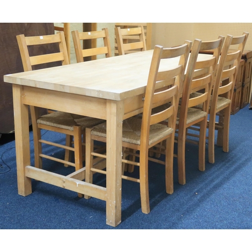 73 - A 20th century white ash dining table with butcher style top over three through drawers on square su... 