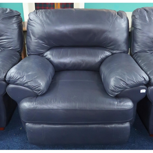 76 - A modern black vinyl upholstered three piece suite comprising three seater sofa and pair of recliner... 