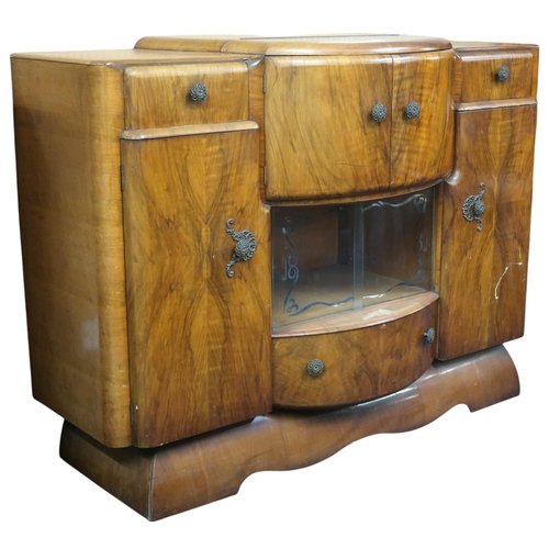 9 - A 20th century Art Deco sideboard/cocktail cabinet with cantilevered two door drinks compartment, 10... 