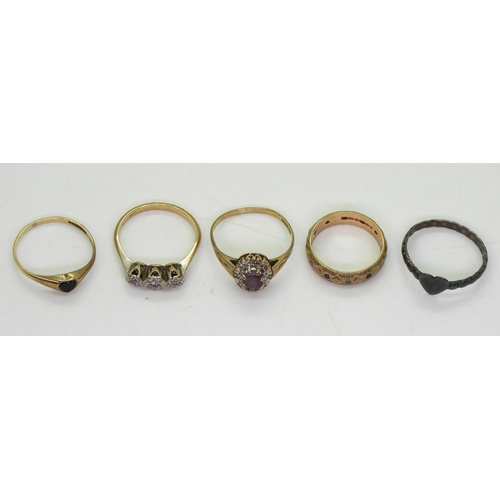 715 - A collection of rings, four in 9ct gold, illusion set three stone size N1/2, purple gem (af) size O1... 