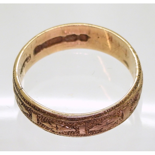 716 - A 9ct rose gold hand engraved pattern wedding ring, hallmarked Birmingham 1879, size P, weight 3.1gm... 