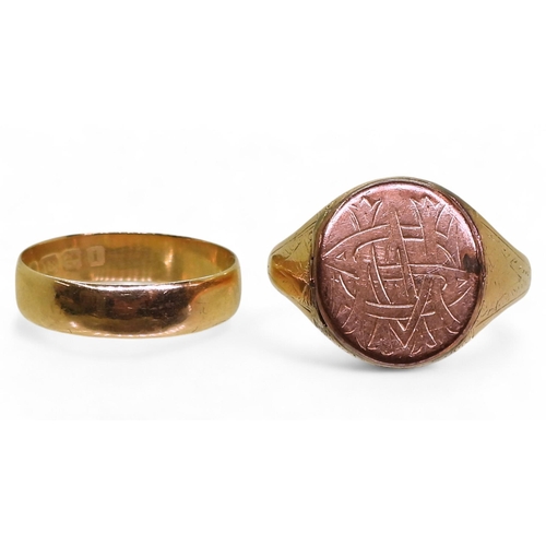 718 - A 15ct gold signet ring, size T1/2, weight 6.7gms, and an 18ct gold wedding ring, size O1/2, weight ... 