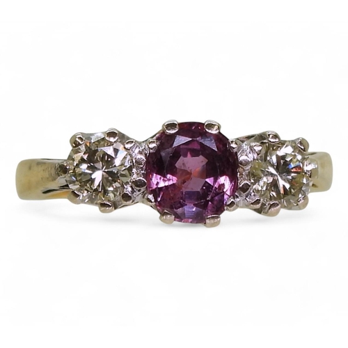 721 - An 18ct gold pink sapphire and diamond ring, sapphire approx 5.8mm x 5.5mm x 2.9mm, diamonds estimat... 