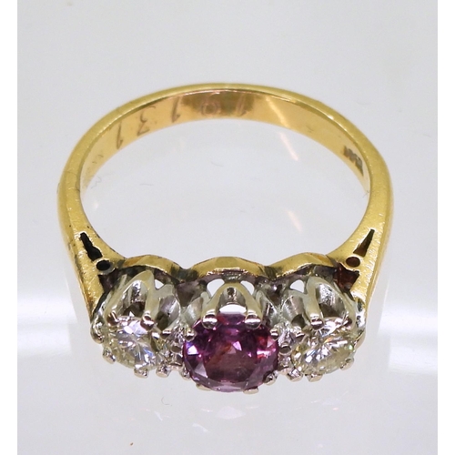 721 - An 18ct gold pink sapphire and diamond ring, sapphire approx 5.8mm x 5.5mm x 2.9mm, diamonds estimat... 