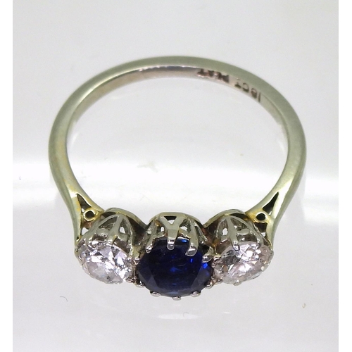 737 - An 18ct white gold and platinum sapphire and diamond three stone ring. The sapphire measures approx ... 