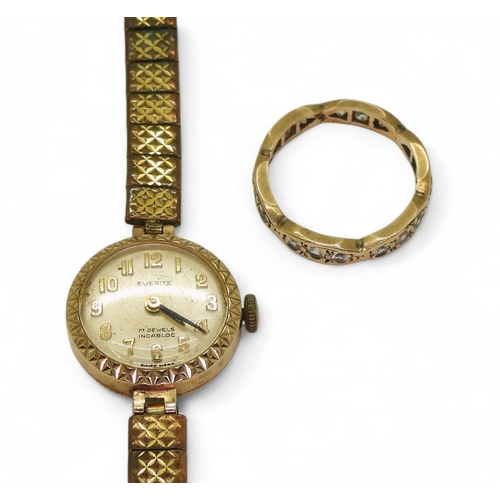 740 - A 9ct gold cased ladies Everite watch with a gold plated strap, and a 9ct gold gem set eternity ring... 