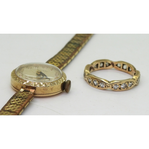 740 - A 9ct gold cased ladies Everite watch with a gold plated strap, and a 9ct gold gem set eternity ring... 