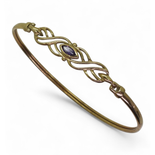 747 - A 9ct gold amethyst bangle, inner diameter 6.5cm, weight 4.7gms