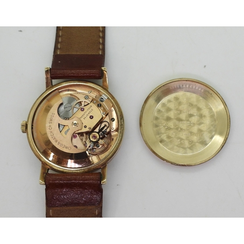 748 - A 9ct gold gents Omega Automatic hallmarked 1964, calibre number 562, movement number 22233554, insc... 