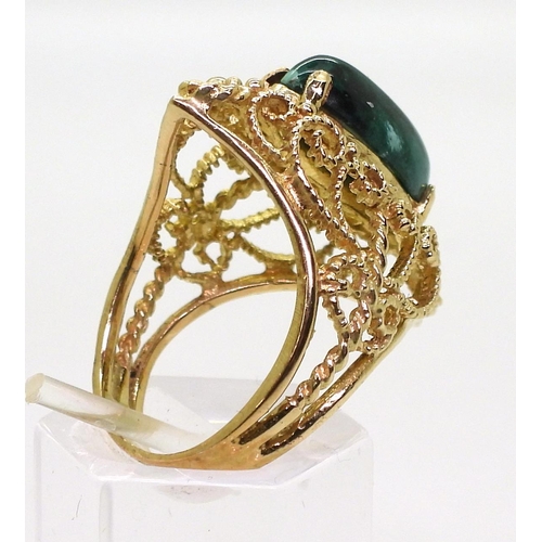 756 - A 14k gold filigree ring set with a malachite, size M1/2, weight 6.9gms