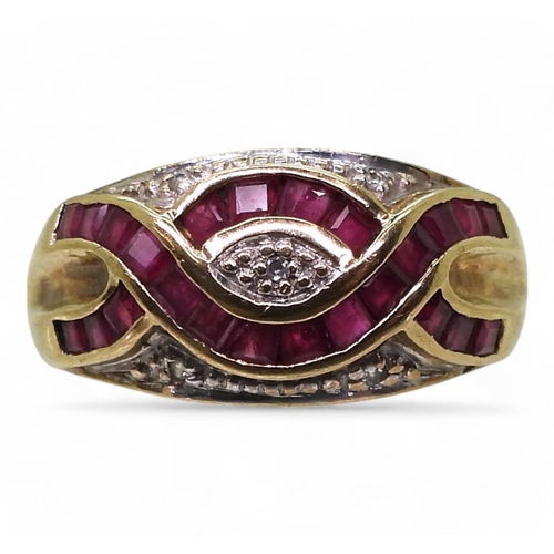 757 - A 9ct gold ruby and diamond accent ring, size T1/2, weight 4.3gms