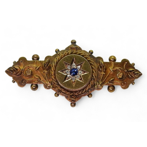 763 - A 15ct gold locket back brooch set with a sapphire and diamond star, length 4.7cm, weight 6.2gms