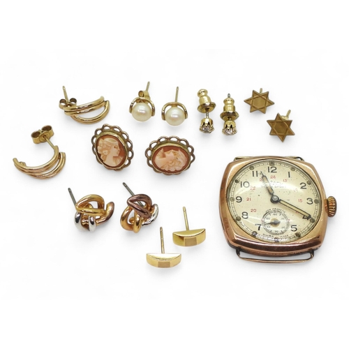 794 - A 9ct gold (af) Rotary watch, and five pairs of 9ct earrings, weight with watch case only and gold e... 