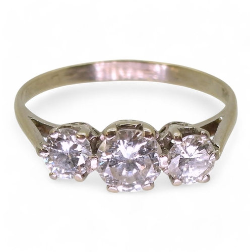 807 - A three stone diamond ring set with estimated approx 1.10cts of brilliant cut diamonds, finger size ... 