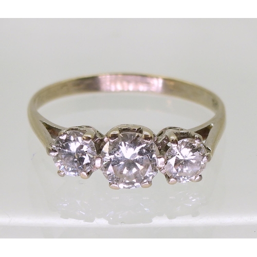 807 - A three stone diamond ring set with estimated approx 1.10cts of brilliant cut diamonds, finger size ... 