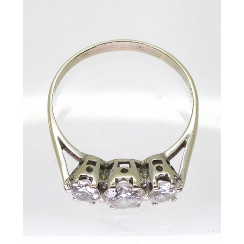 807 - A three stone diamond ring set with estimated approx 1.10cts of brilliant cut diamonds, finger size ... 