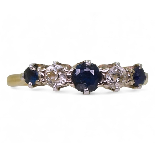 810 - An 18ct and platinum sapphire and diamond ring, set with two estimated approx 0.10cts, finger size W... 