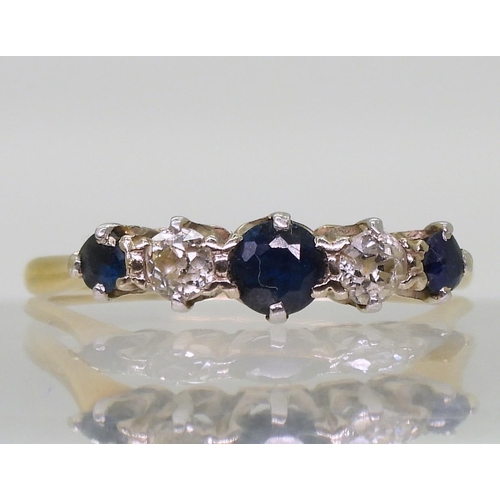 810 - An 18ct and platinum sapphire and diamond ring, set with two estimated approx 0.10cts, finger size W... 